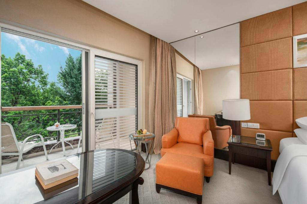 New Century Grand Hotel סוג'ואו מראה חיצוני תמונה