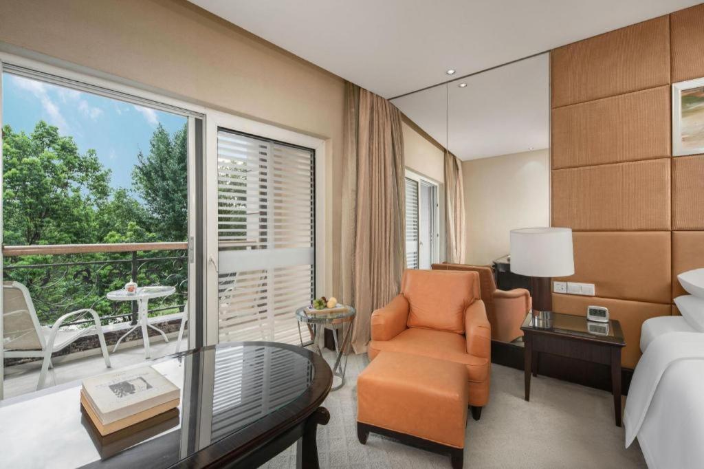 New Century Grand Hotel סוג'ואו מראה חיצוני תמונה