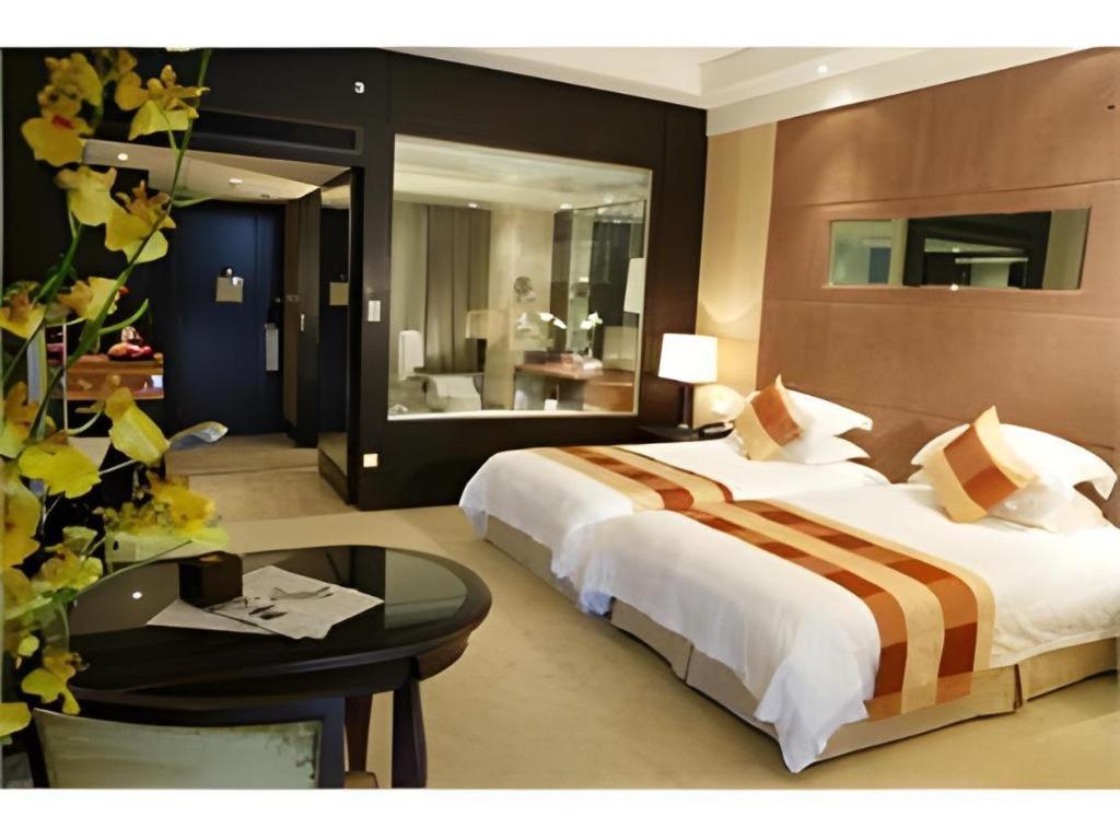 New Century Grand Hotel סוג'ואו מראה חיצוני תמונה