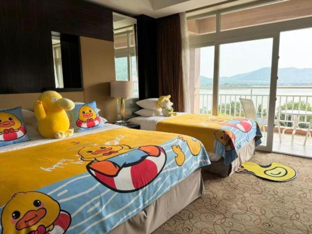 New Century Grand Hotel סוג'ואו מראה חיצוני תמונה