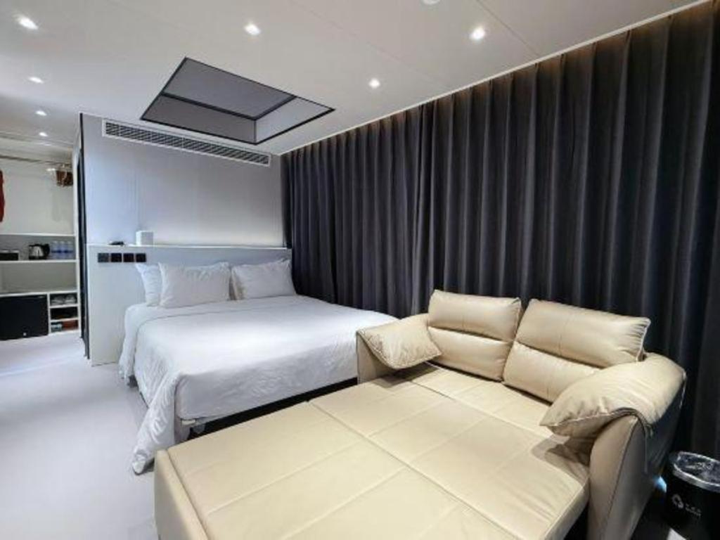 New Century Grand Hotel סוג'ואו מראה חיצוני תמונה