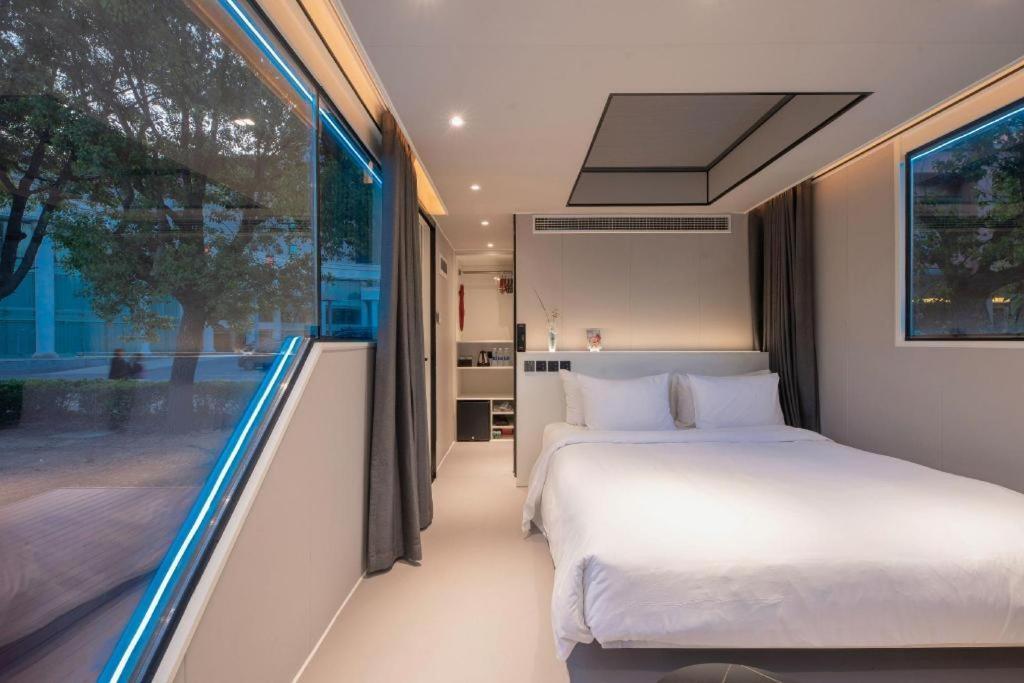 New Century Grand Hotel סוג'ואו מראה חיצוני תמונה