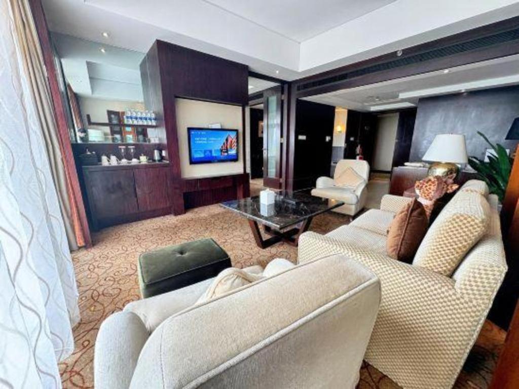 New Century Grand Hotel סוג'ואו מראה חיצוני תמונה