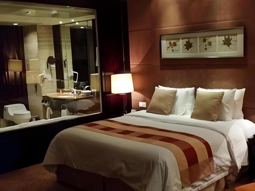 New Century Grand Hotel סוג'ואו מראה חיצוני תמונה