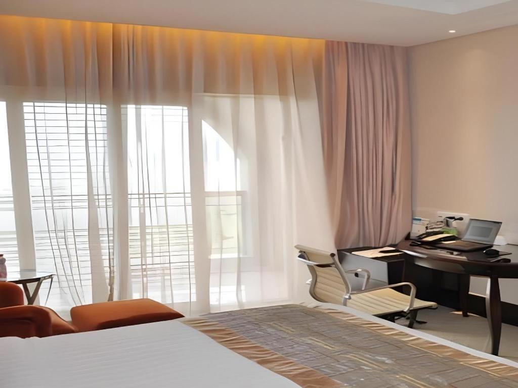 New Century Grand Hotel סוג'ואו מראה חיצוני תמונה