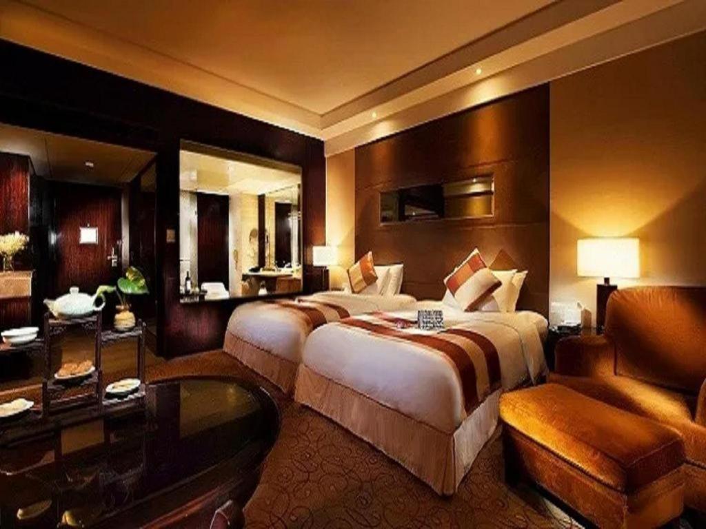 New Century Grand Hotel סוג'ואו מראה חיצוני תמונה