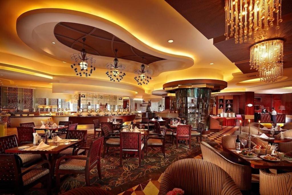 New Century Grand Hotel סוג'ואו מראה חיצוני תמונה
